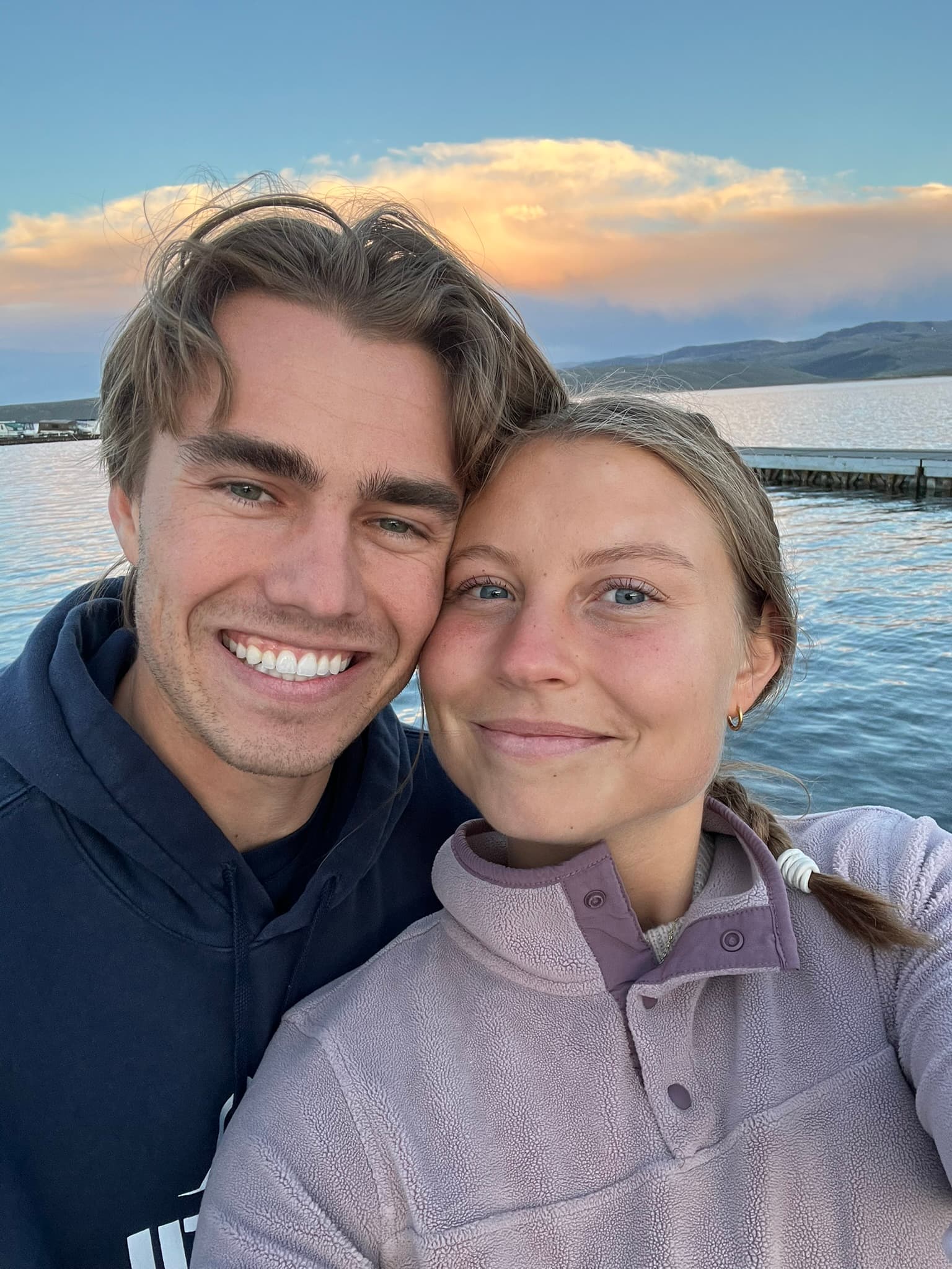 Carson and Courtney at sunset by a lake